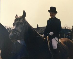 Clara riding her first own horse at a village event after years of riding pony club loan ponies